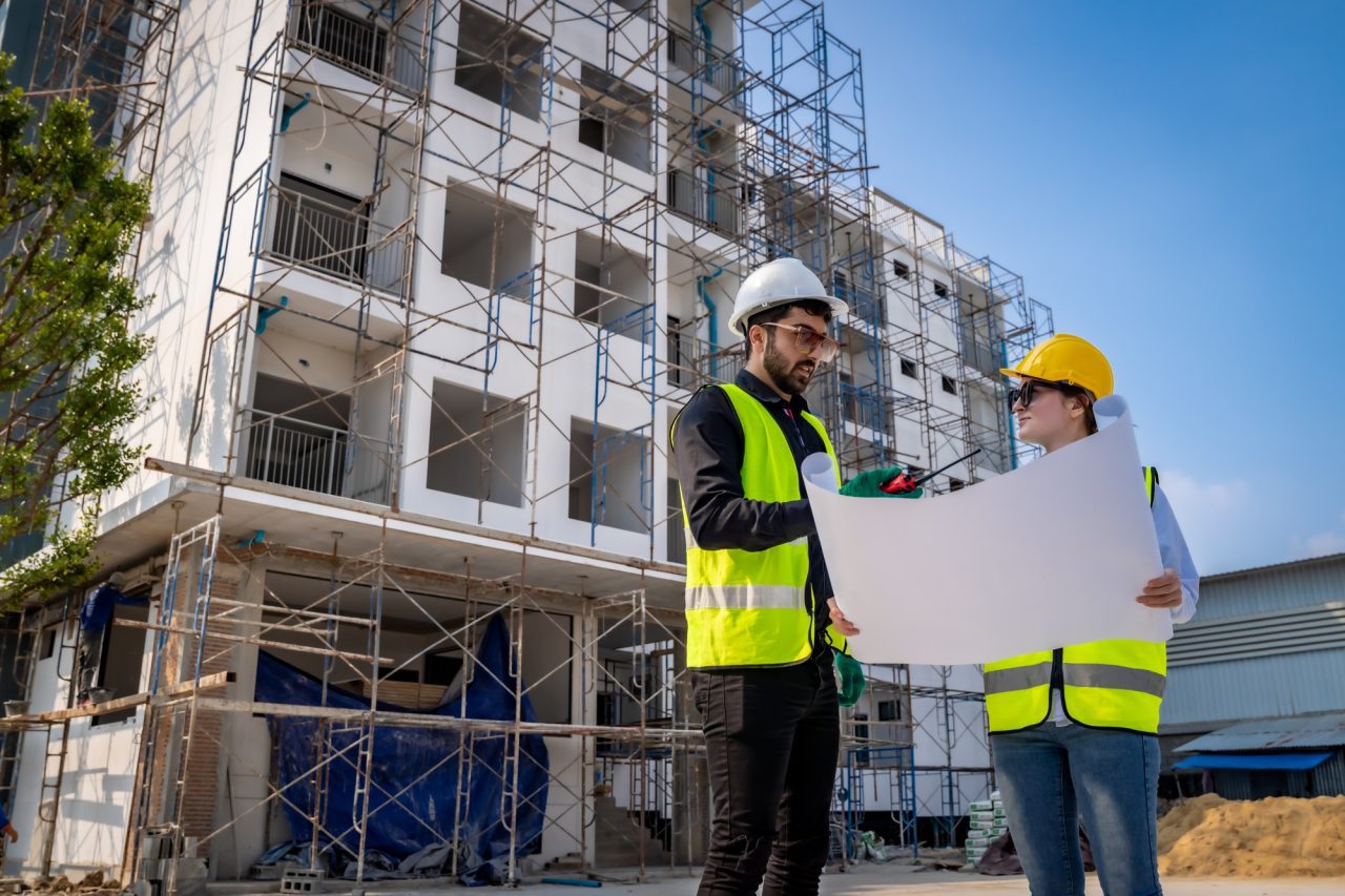 engineer inspect building structure technicians looking at analyzing unfinished construction project 1.jpg